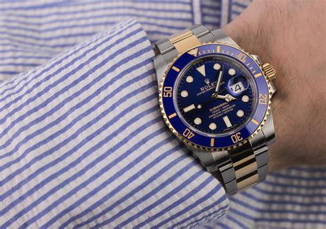 rolex submariner wrist watch.